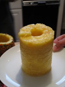 cored pineapple with pineapple corer