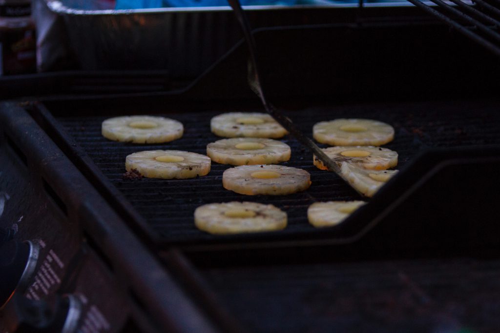 Pineapple rings on a grill for vegetarian Memorial Day.