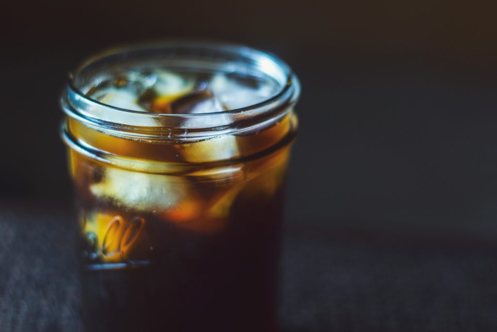 Pineapple green iced tea in a mason jar